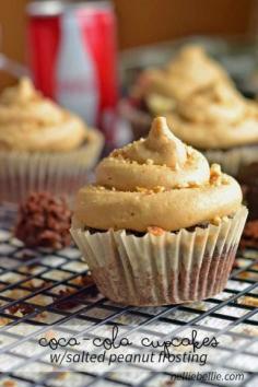 
                    
                        Coca Cola cupcakes with cola cream filling and salted peanut frosting. Seriously amazing!
                    
                