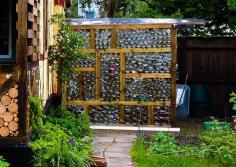 
                    
                        Greenhouse made out of glas jars - includes water catchment system.
                    
                