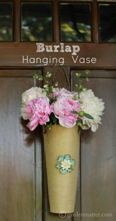 
                    
                        Learn how to make a simple hanging flower vase from a burlap placemat.
                    
                