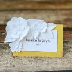 
                    
                        These elegant sculptural paper flower seating cards are so easy and fast to make!
                    
                