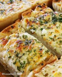 
                    
                        Recipe for Bubbly Cheese Garlic Bread - We love all varieties of bread. Add a little garlic, some butter, a bunch of cheese, and throw it in the oven…and we’re even happier!
                    
                