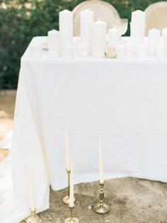 
                    
                        Candle covered sweetheart table: www.stylemepretty... | Photography: Honey Honey - www.hoooney.com/
                    
                