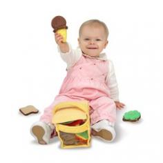 Here's everything needed for a picnic (except the ants!). Remove and replace the four colorful picnic treats from a flip-top picnic basket. This soft play set features a wedge of watermelon, a bottled fruit drink, a take-apart sandwich and an ice cream cone. Constructed of high quality fabrics and phthalate-free plastic, this durable set will provide hours of pretend picnic fun! For ages 18 months and up. Share hours of fun with your child! Order the Melissa & Doug Toys - Picnic Basket Fill and Spill today, from Brookstone. Dimensions: 10" x 6" x 11" Packaged.