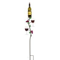 Hand painted grape and vine metal sculpture is 41 in. tall. Holds one stemmed wine or beverage glass. Vineyard pattern. 7 in. L x 42 in. H (2 lbs.)Simply push the extended double prong base into the ground with your foot and you are ready to enjoy outdoor life. No need to worry about your wine glass falling over from the uneven ground. The Grapevine Wine Glass Ground Stake comes in handy for backyard entertaining, outdoor concerts, beach parties, picnics or just enjoying the sun set.