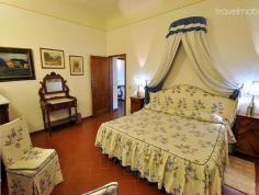 Country suite Oliva is one of twelve apartments located in the estate, a 15th century place situated on the lush green hills between Fiesole and Florence. It is just five kilometres away from the city of Florence and 2.5 kilometres from Fiesole. The estate is an organic agricultural estate of 300 hectares. It is used mainly for growing olives, there are about 20,000 olive trees covering 110 hectares. The Frantoio and Moraiolo olives are picked by hand during the end of the year and pressed in the estate mill. There is also extra virgin olive oil produced in the estate "Laudemio" which has a high nutrition value. All of these apartments were once an ancient single building or a convent building. It has been newly renovated with style and comfort. There is an exclusive swimming pool in the gardens with breathtaking views of the Tuscan countryside. Also, available are a teaching farm, art class, Olive mill tours, night safaris and gastronomy tours. You can also find a beautiful restaurant "Lo Spaccio" offering local Tuscan cuisine. It is equipped with a scenic terrace, wooden rooms with comfortable furniture suited for breakfast, lunch, grilled evenings etc and there is also a small market where you can buy local products. Country suite Oliva is located on the third and the last floor of the main building (convent building) and sleeps 6 to 7 people in 3 beautiful bedrooms. It has two double bedrooms, a twin bedroom, a living room with sofa bed, a small but professional kitchen and two bathrooms. There is also a huge terrace with amazing views of the countryside, hills and olive groves. Other facilities include free internet station in the reception, free wireless connection, supermarkets, restaurant, swimming pool, playground, car parking (3 parking areas), Fun Park and outdoor gardens. Another interesting site in the estate include the Villa, the primary home of the estate. It is equipped with many rooms like the Tapestries Room, Red Lounge, Old dining room, Carriage Room and the Billiard room. All these rooms have unique and original furnishings. It also has a huge terrace with amazing views of Florence. The Villa di Maiano is the host for many anniversary dinners, parties, meetings etc. It has featured in many movies like Tea with Mussolini by Franco Zeffirelli and A Room with a View by James Ivory. A 15th century Chiostro, the Madonna Della Misericordia fresco, an old convent dining hall "Sala del Convitto" and an olive storage room "Sala Olivaia" is located on an integral part of the estate. The Chiostro, the dining hall and the storage room are now used for conducting food and olive oil tasting, parties, functions and business meetings. Most importantly, they have been used for hosting the famous Fattoria di Maiano music and theatre festival. This apartment can be rented along with other apartments belong to the same estate for people who wish to stay together with their entire family.