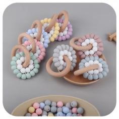 https://www.newtoprubber.com/product/silicone-bead-beechwood-teether-ring_i_166121.html